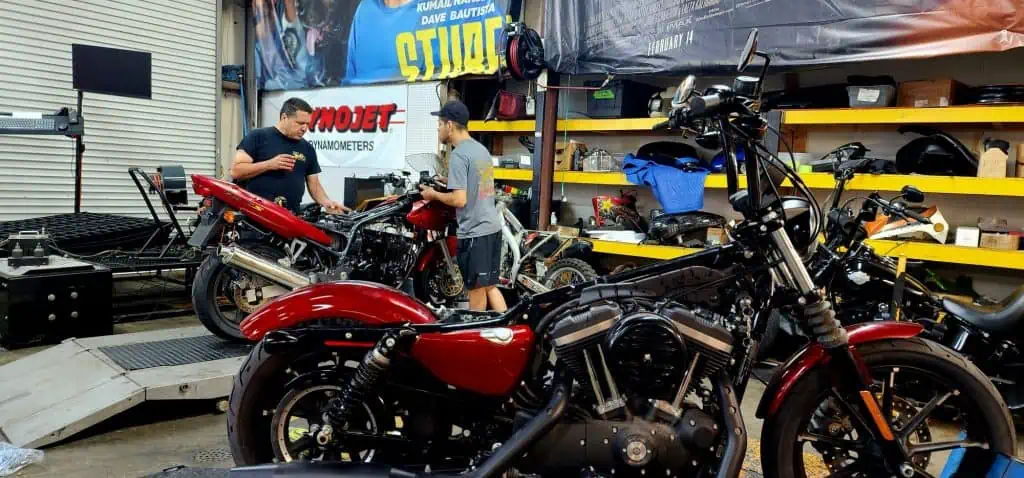 motorcycle being prepared for dyno tunning.