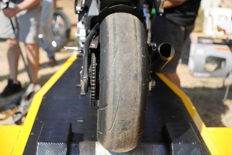 Rear view of motorcycle on tuning dyno.