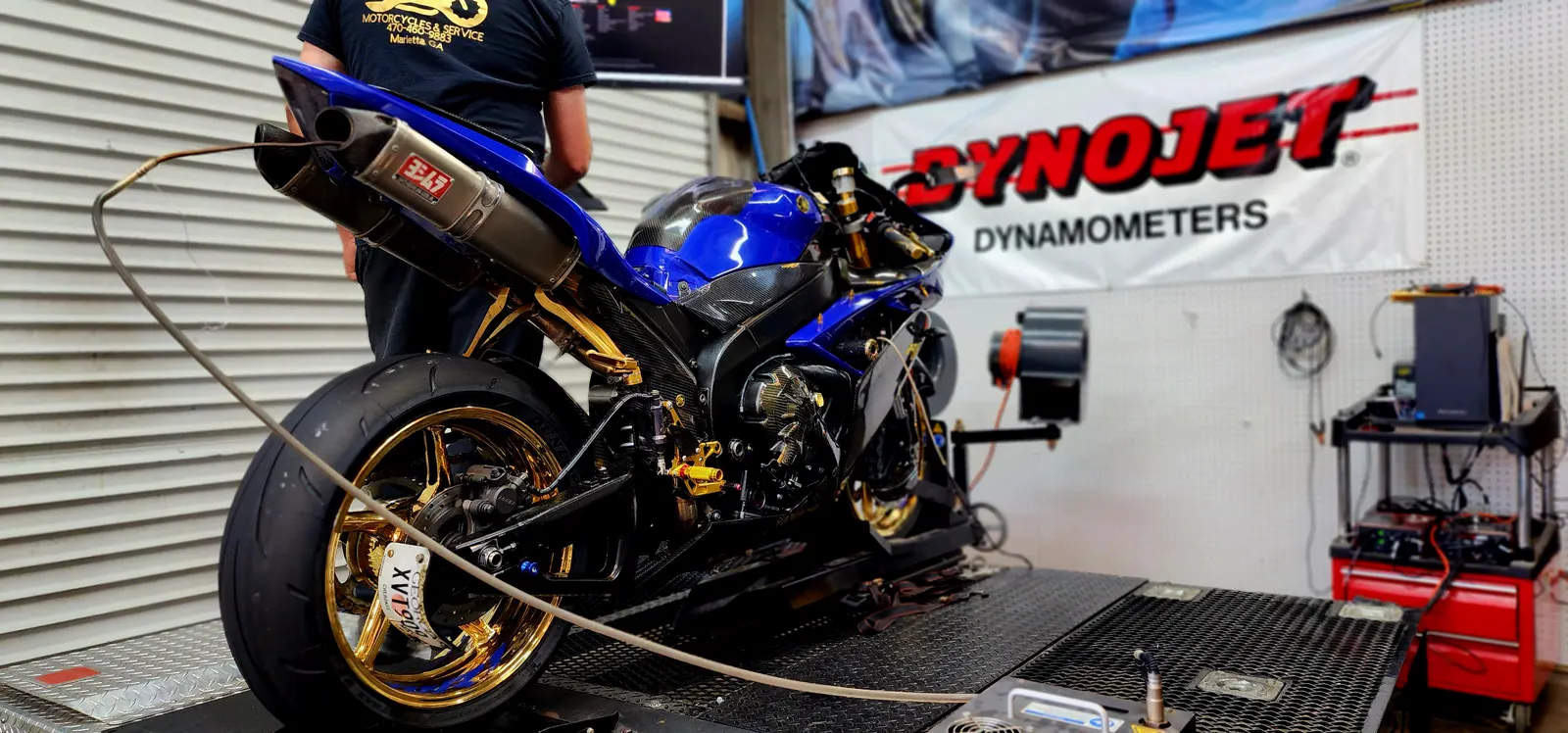 Blue Yamaha R6 with gold wheels strapped on the dyno at Diaz Motorcycles